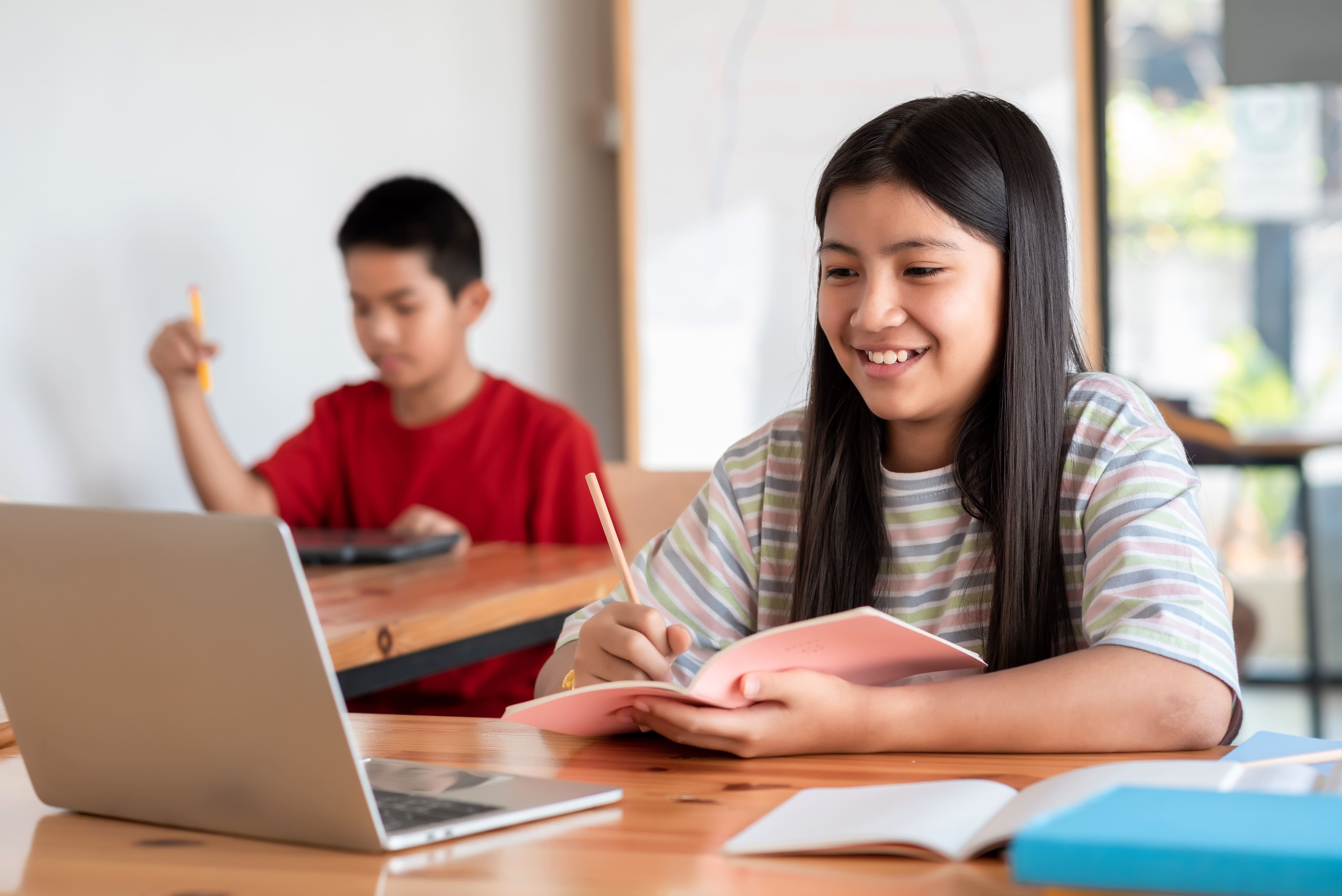 Students practising problem-solving strategies during a math olympiad preparation class.