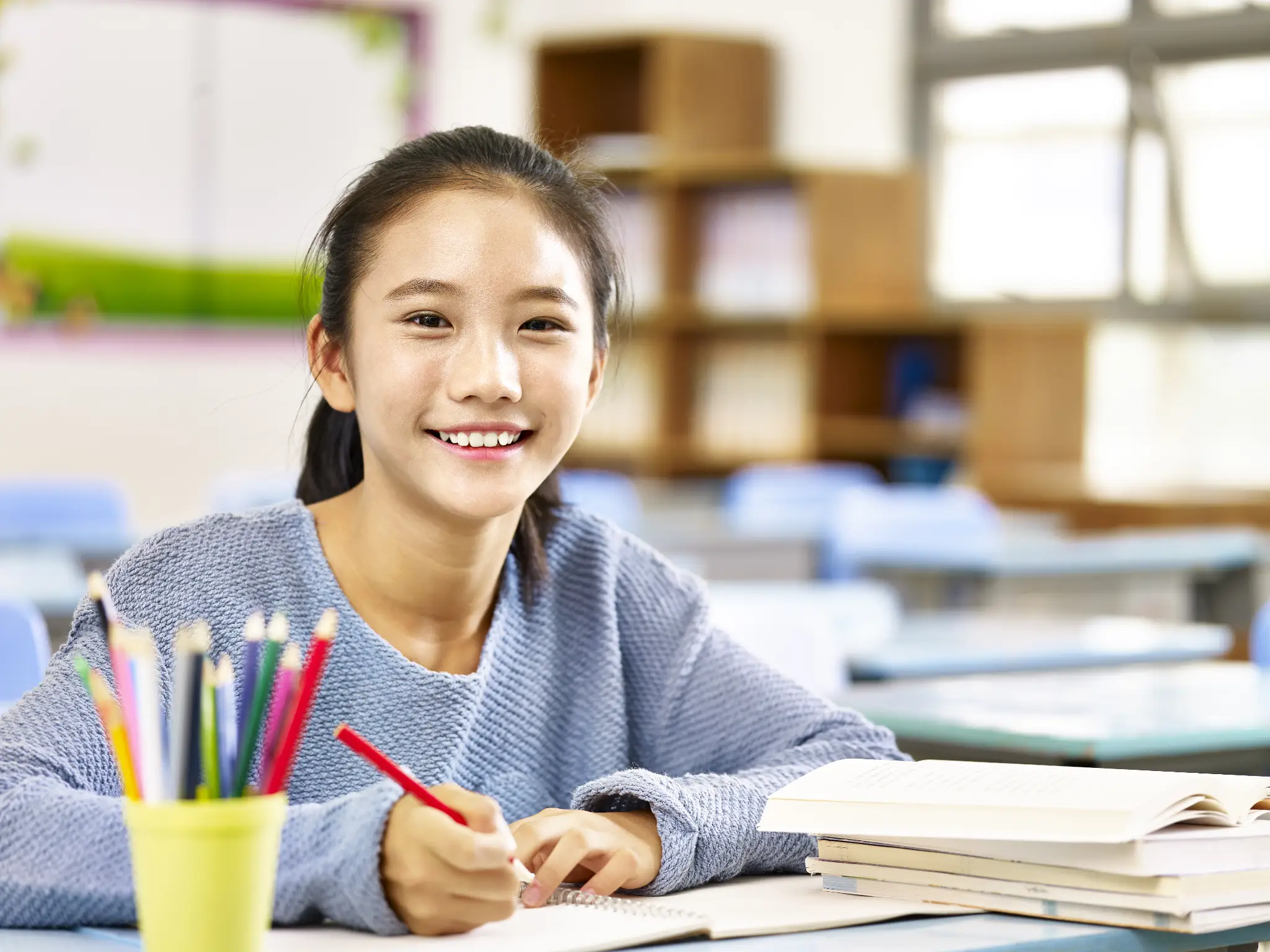 Young student preparing for mathematics competitions through a math tuition centre