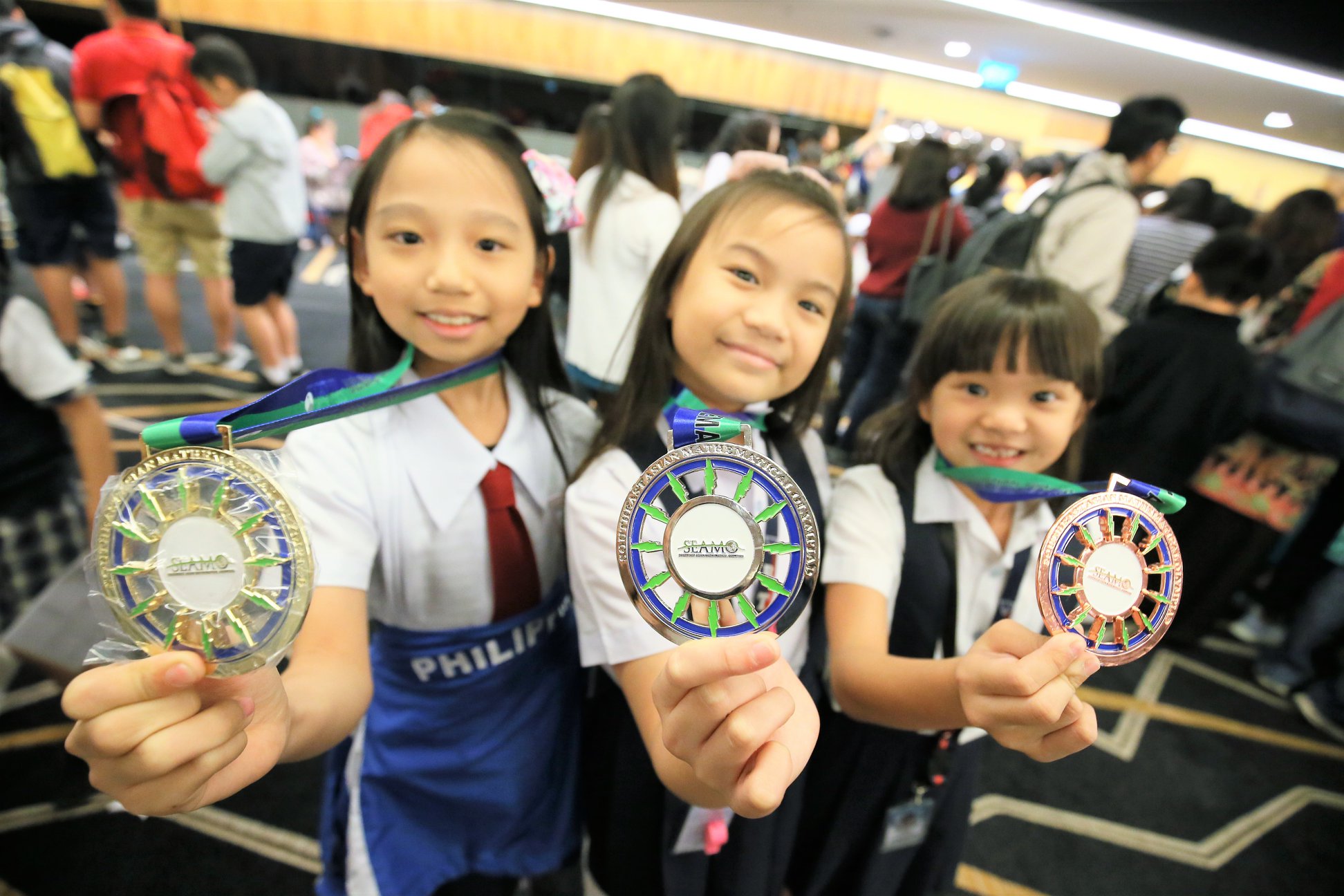 Terry Chew Academy Math Olympiads Champions showing their SEAMO medals