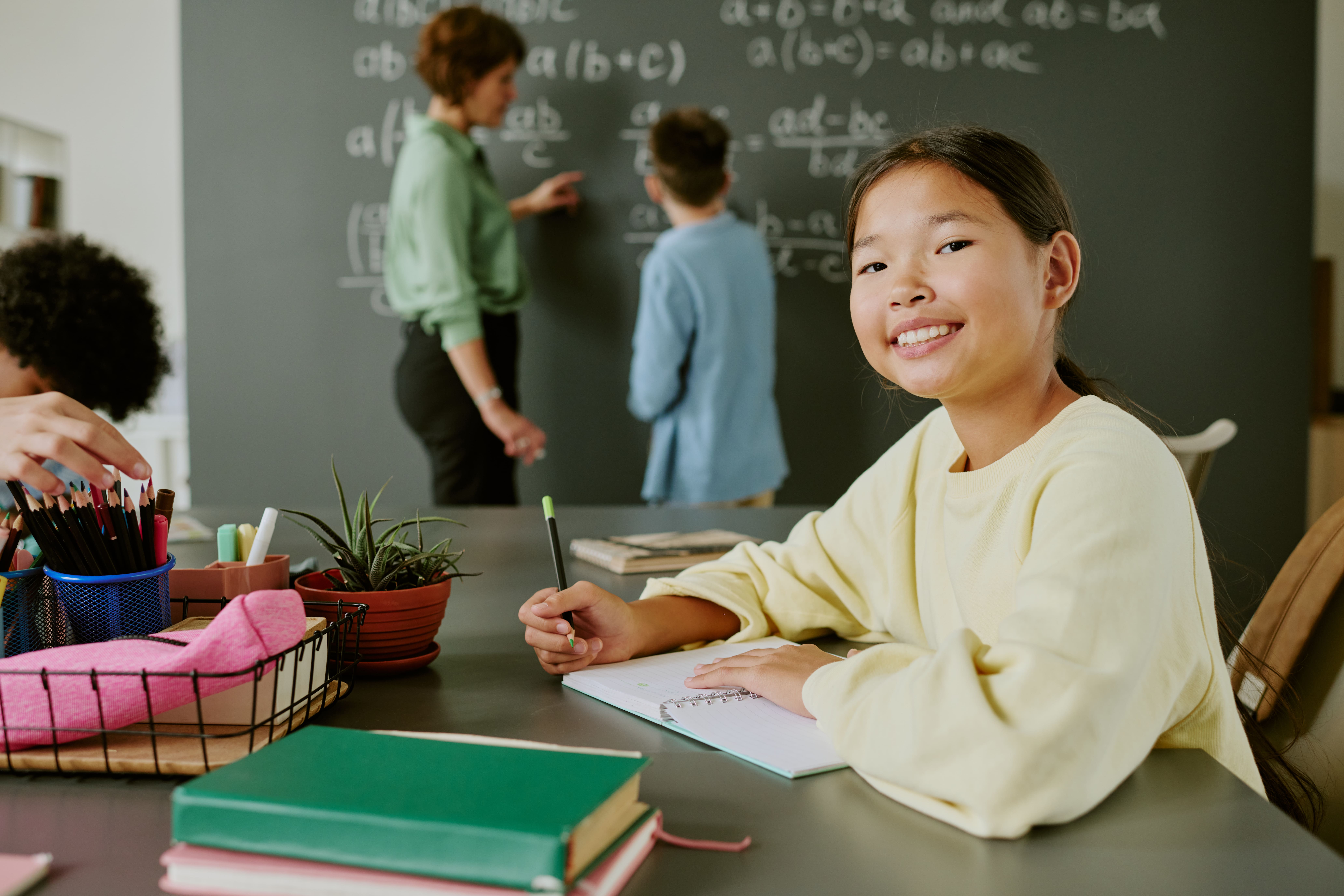 a happy student at a maths enrichment class in Singapore